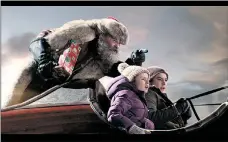  ?? MICHAEL GIBSON/NETFLIX ?? Kurt Russell (left), Darby Camp and Judah Lewis star in ‘The Christmas Chronicles.’ Santa Claus gets help from the children in an attempt to save Christmas.