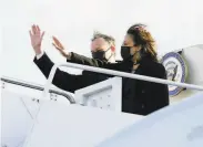  ?? Jacquelyn Martin / Associated Press ?? Vice President Kamala Harris and her husband, Doug Emhoff, wave as they board Air Force Two.