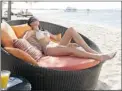  ??  ?? A beach bed is a great place to relax.