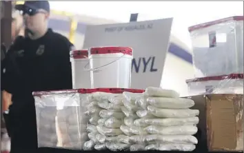  ?? Mamta Popat Arizona Daily Star ?? PILES OF fentanyl and meth seized by U.S. Customs and Border Protection officers are displayed in 2019.