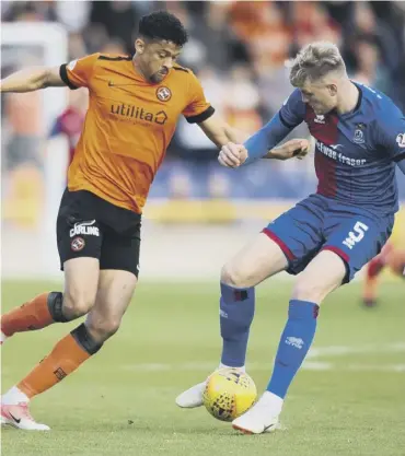  ??  ?? 0 Osman Sow takes on defender Coll Donaldson during Dundee United’s 1-0 victory on Tuesday.