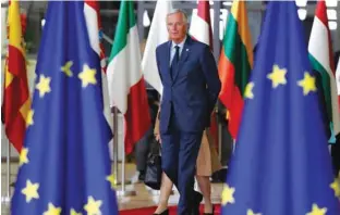  ?? - Reuters/Yves Herman ?? SOFTENING STANCE: European Union’s chief Brexit negotiator Michel Barnier arrives at an European Union leaders summit in Brussels, Belgium October 17, 2018.