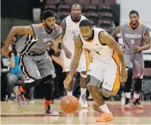  ?? JAMES PARK/OTTAWA CITIZEN ?? The Ottawa SkyHawks’ Jerice Crouch, right, dribbles past Moncton Miracles Sylvania Watkins during their game at the Canadian Tire Centre on Wednesday. The SkyHawks held on for a 126-114 victory.