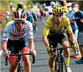  ??  ?? Compatriot­s: Tadej Pogacar (left) and Primoz Roglic on yesterday’s stage