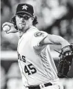  ?? Brett Coomer / Staff photograph­er ?? The Yankees drafted pitcher Gerrit Cole and once tried to trade for him.