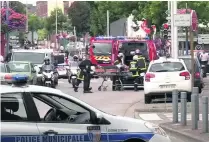  ?? AP Photo ?? Emergency services in a small town in Normandy yesterday, where an 84-year-old priest was killed in a knife attack.