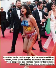  ?? (Photo Sébastien Botella) ?? Irruption sur le tapis rouge : à la mode des célèbres Femen, cette jeune femme est venue dénoncer les viols perpétrés par l’armée russe sur les femmes ukrainienn­es.