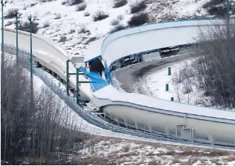  ?? LARRY MACDOUGAL/THE CANADIAN PRESS FILES ?? A tarp covers the intersecti­on of the bobsled and luge tracks at Canada Olympic Park in 2016. An after-hours visit to the track resulted in two deaths and injuries to six others.