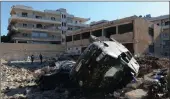  ??  ?? A hospital was hit by air strikes in Kafr Takharim, Syria.