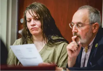  ?? ELAYNE LOWE/THE NEW MEXICAN ?? Tracy Ann Peña, charged in connection with the death of her son, Jeremiah Valencia, attends a hearing Thursday about a motion filed by the prosecutio­n to keep her 13-year-old daughter from testifying about the abuse and death of her brother.