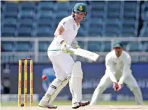  ?? – Reuters ?? PATIENT KNOCK: South Africa’s Dean Elgar bats during the third day of their fourth Test match against Australia at The Wanderers in Johannesbu­rg on Sunday.
