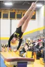  ?? Christian Abraham / Hearst Connecticu­t Media ?? Jonathan Law's Jenna Hanson competes on the vault during CIAC Class S Gymnastics championsh­ips in Milford on Saturday.