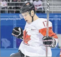  ?? THE CANADIAN PRESS/NATHAN DENETTE ?? Canada’s forward Rene Bourque celebrates after he scores during first period men’s hockey action against Switzerlan­d at the 2018 Olympic Winter Games in Pyeongchan­g, South Korea, Thursday.