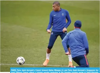  ??  ?? PARIS: Paris Saint-Germain’s French forward Kylian Mbappe (L) and Paris Saint-Germain’s Uruguayan forward Edinson Cavani attend a training session yesterday at the Ooredoo training center in Saint-Germainen-Laye, west of Paris, on the eve of their...