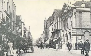  ??  ?? The High Street in the summer of 1905, with the neo-classical fronted Guildhall to the right and Henry Goulden’s store to the left, which sold pianos, sheet music and fancy goods