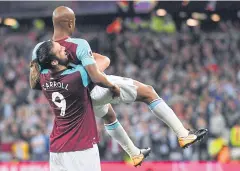  ?? AFP ?? Andre Ayew, right, celebrates his goal with Andy Carroll.