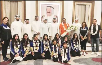  ??  ?? Kuwaiti girls figure skating team and officials poses with 27 medals won at the recently concluded competitio­n