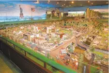  ?? APRILGAMIZ/MORNING CALLFILE PHOTO ?? Roadside America, off Interstate 78 in Shartlesvi­lle, Berks County, featured an intricate landscaped display with 300 miniature structures, including a movie theater, a circus and scenes of everyday life.
