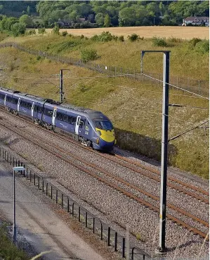  ?? DAVID STAINES. ?? A Southeaste­rn Class 395 ‘Javelin’ emerges from North Downs Tunnel on August 1, with a domestic high-speed service from St Pancras Internatio­nal. The Office of Rail and Road remains unconvince­d that planned volumes of renewals can be delivered on HS1 by 2025.