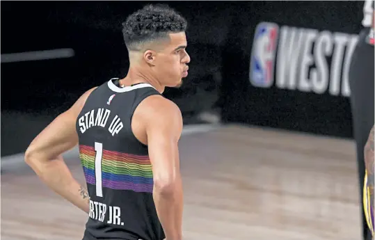  ?? AAron Ontiveroz, The Denver Post ?? The Nuggets’ Michael Porter Jr. takes the floor against the Los Angeles Lakers during Game 4 of the Western Conference Finals.