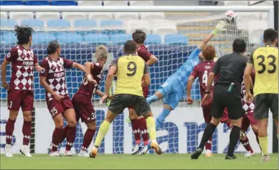  ??  ?? Guangzhou Evergrande’s forward Ai Kesen (No. 9) scores from a free-kick during the AFC Champions League Group G match against Japan’s Vissel Kobe at the Al Janoub Stadium on Saturday. (AFP)