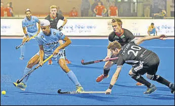  ?? PTI ?? India’s Mandeep Singh tries to get past German defenders during a HWL Final match on Monday.