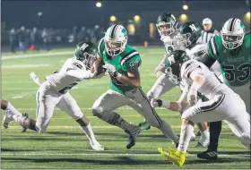  ?? FRANK GAMBATESE — FOR THE NEWS-HERALD ?? Mayfield running back Joey Dostal runs through the Nordonia defense on Oct. 16 at Wildcat Stadium.