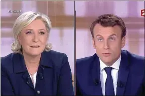  ??  ?? Les candidats en plein échange d’amabilités sur le plateau de France 2.