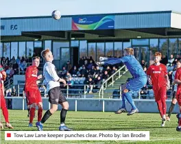  ?? ?? Tow Law Lane keeper punches clear. Photo by: Ian Brodie