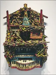  ?? JOE WOJTAS/THE DAY ?? Kevin Sampson’s mixed media sculpture entitled Engine Co. 7 honors the lower Manhattan fire station that was given the nickname the Lucky 7 after none of its members perished in the World Trade Center attacks.