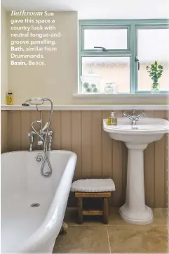  ??  ?? Bathroom Sue gave this space a country look with neutral tongue-andgroove panelling. Bath, similar from Drummonds.Basin, Bence.