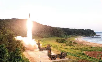  ?? AP FOTO ?? TEST FIRE. In this photo provided by South Korea Defense Ministry, South Korea’s Hyunmoo II ballistic missile is fired during an exercise at an undisclose­d location in South Korea Monday.