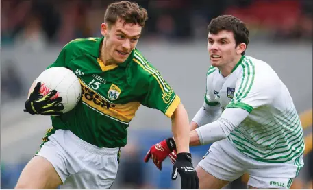  ??  ?? Tomas Ó Sé of Kerry in action against Mike O’Keefe of Limerick during the Munster Junior Football Championsh­ip semi-final between at Cusack Park, in Ennis, Co. Clare Photo by Sportsfile