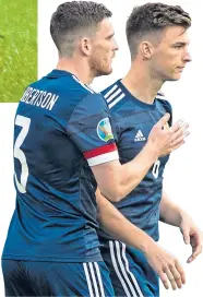  ??  ?? Andy Robertson and Kieran Tierney have shared and swapped full-back duties with Scotland