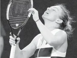  ?? AARON FAVILA/AP ?? Top-ranked Simona Halep reacts after beating Sofia Kenin in the second round Thursday.