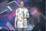  ?? CHRIS PIZZELLO — INVISION/VIA AP ?? Snoop Dogg presents the award for best game at the 2017 ESPYS in Los Angeles.