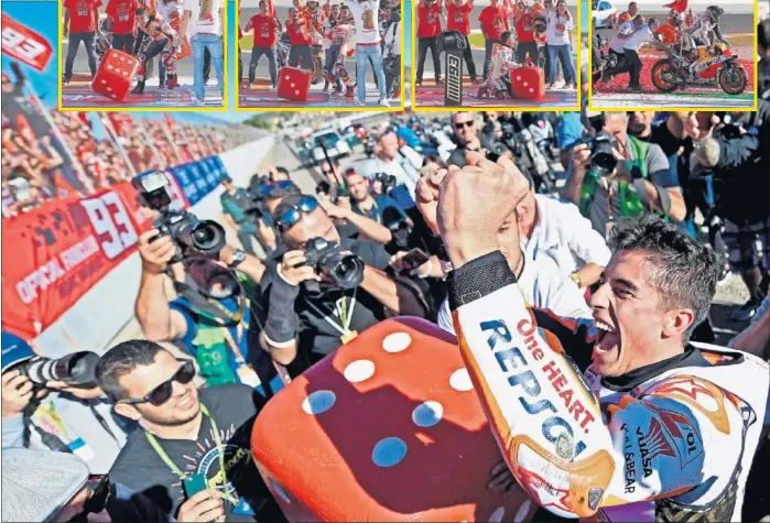 ??  ?? CELEBRACIÓ­N. Lanzó el dado y salió el seis: Márquez se detuvo delante de la grada que ocupaba su club de fans para festejar su sexto título mundialist­a, cuarto en MotoGP.