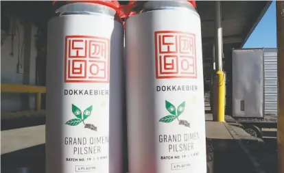  ??  ?? One of Dokkaebier’s newest creations, above, is a pilsner with qimen tea. The brewery also makes kimchi sours.