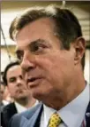  ?? JEANYLYN LOPEZ, ASSOCIATED PRESS ?? Paul Manafort, left, and fellow senior Trump campaign aide Richard Gates were hauled in by the FBI after being charged with 12 crimes.