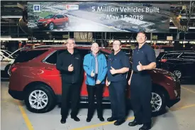  ??  ?? Shown celebratin­g the five millionth vehicle to roll off the CAMI Assembly Plant line in Ingersoll are from left; Pat Shea, sales manager, Searles Motor Products; Bob Searles, president/owner, Searles Motor Products; Bill Morrison, CAMI assistant plant...