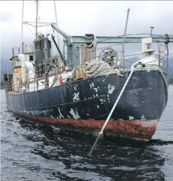  ?? PAUL KYBA ?? Bill Veenhof, chair of the Regional District of Nanaimo, says he has been warned by Environmen­t Canada that if the Laurier II sinks in Deep Bay, the area’s shellfish industry could be shut down for a year.