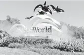  ?? JOHN RAOUX/ASSOCIATED PRESS ?? The entrance to SeaWorld in Orlando. Before the coronaviru­s pandemic, Orlando was the nation’s most visited tourist destinatio­n.
