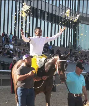  ?? The Sentinel-Record/Richard Rasmussen ?? FANTASY UPGRADE: Jockey Ricardo Santana Jr. celebrates aboard Lady Apple after winning the Fantasy Stakes at Oaklawn Park on April 12, 2019.