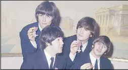  ?? AP ?? Beatles members George Harrison, Paul McCartney, John Lennon and Ringo Starr are shown in a photo taken on Oct. 26, 1965.