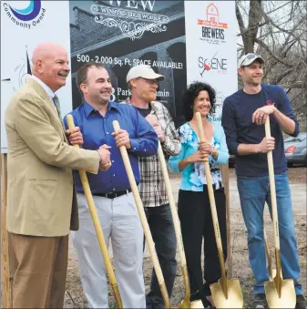  ?? Leslie Hutchison / Hearst Connecticu­t Media ?? The team from Little Red Barn Brewers, from right, Matthew Day, owner; Kate Wenzel, graphic artist; Nathan Day, owner; and Nils Johnson, owner; celebrate with developer Brian Lyman at the groundbrea­king ceremony for the Winsted Edge Works.