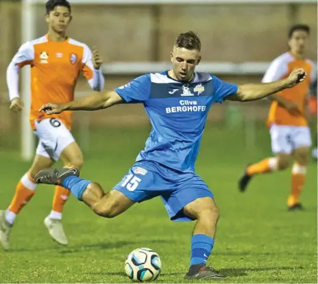  ?? JASON GIBBS jason.gibbs@thechronic­le.com.au
Photo: Nev Madsen ?? DOUBLE DELIGHT: South West Queensland Thunder striker Anthony Grant scored two goals in his side’s 4-0 win over Brisbane Roar at Clive Berghofer Stadium on Saturday night.