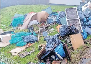  ?? ?? Disgracefu­l Fly-tipping like this in Calderwood, East Kilbride, costs the taxpayer