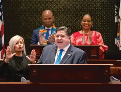  ?? AP ?? Gov. J.B. Pritzker delivers his combined budget and State of the State address to the General Assembly on Wednesday.