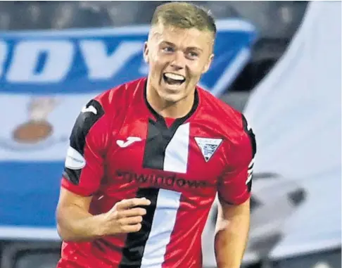  ??  ?? DERBY DOUBLE: Fraser Murray scored twice as Dunfermlin­e beat Fife rivals Raith Rovers to move up to second.