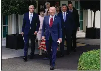  ?? (AP/Evan Vucci) ?? President Joe Biden steps outside the White House with a bipartisan group of senators Thursday to announce agreement on an infrastruc­ture bill. “They’ve given me their word,” he said of the five Republican­s and five Democrats. “Where I come from, that’s good enough for me.”